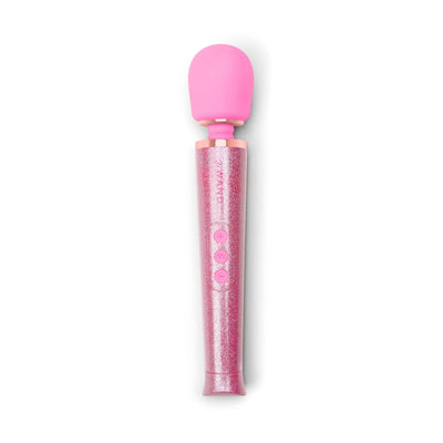 Pink Le Wand Petite wand massager with glittery handle and three control buttons on white background.