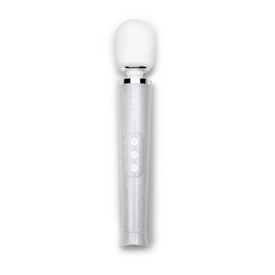 Silver glitter Le Wand Petite massager with white rounded head and three control buttons on the handle.