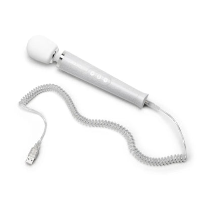 Le Wand All That Glimmers Petite wand vibrator in glittery silver with coiled USB charging cable on white background.