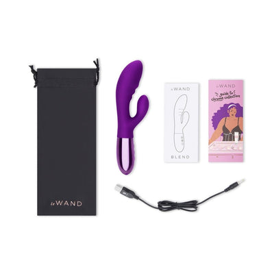 Le Wand Blend purple double-motor rabbit vibrator with black storage pouch, USB charging cable, and user guides on white background.