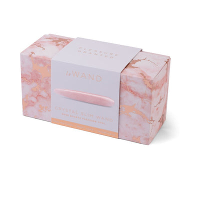 Le Wand Crystal Slim Wand rose quartz pleasure tool in elegant pink marble-patterned box with soft lavender sleeve.