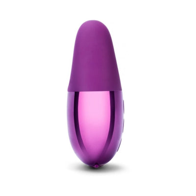 Compact purple Le Wand Double Vibe with smooth silicone tip and glossy body, designed for targeted dual stimulation.