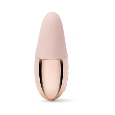 Compact Le Wand Double Vibe in soft pink and rose gold with smooth, sleek design and rounded tip.