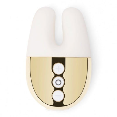 Compact white and gold Le Wand Double Vibe with dual prongs and three control buttons for adjustable vibration settings.