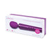 Le Wand Petite rechargeable vibrating massager in purple shown in its packaging box with award badge.