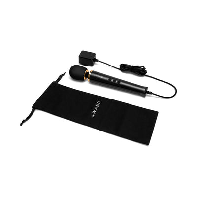 Le Wand Powerful Petite Plug-in massager in black with gold accents, featuring a flexible head, control buttons, power cord, and branded storage pouch.