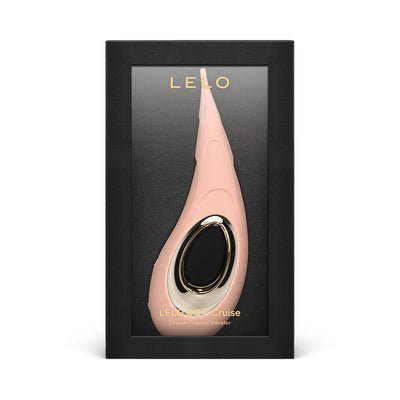 LELO Dot Cruise clitoral pinpoint vibrator in soft pink with gold and black accents displayed in black gift box.