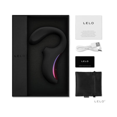 Lelo Enigma black dual-action massager with USB charger, storage pouch, warranty card, and user manual in sleek black packaging.