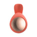 Top view of coral-colored Lelo Ida Wave dual stimulator with smooth silicone and metallic accent ring.