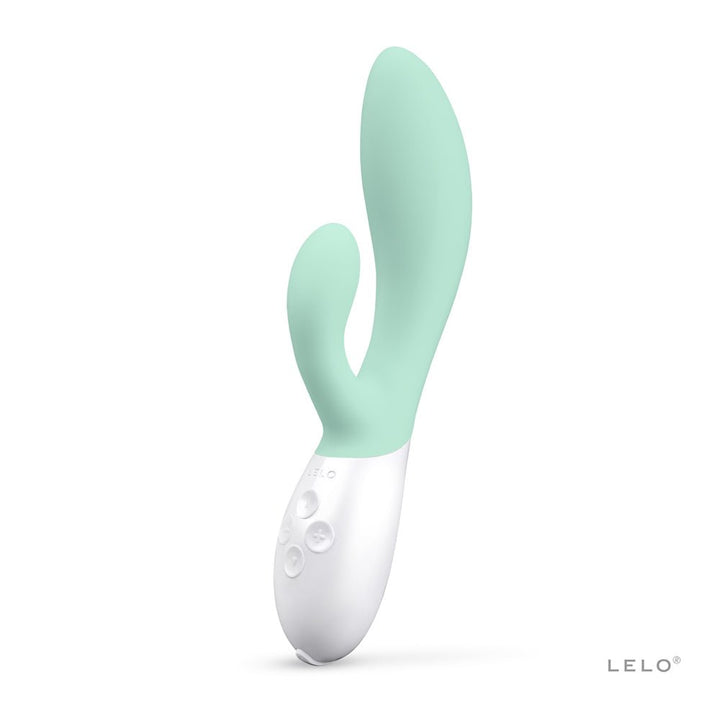 Lelo Ina 3 dual stimulator in mint green with ergonomic design and white control base on a white background