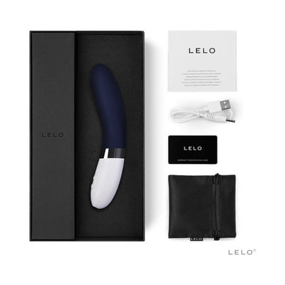 Lelo Liv 2 vibrator in black and white with USB charging cable, warranty card, user manual, and black storage pouch in packaging box.