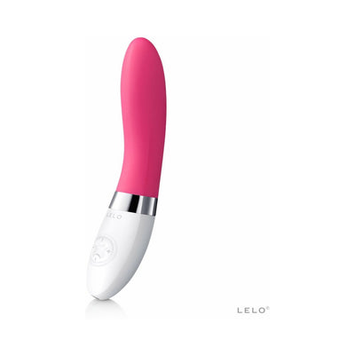 Pink and white sleek personal massager with ergonomic design and control buttons on the handle by LELO