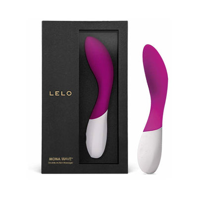 Purple and white Lelo Mona Wave G-spot stimulator with ergonomic curve shown in packaging and standing upright.