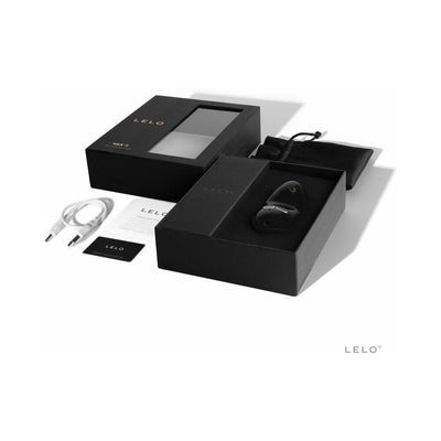 Lelo Nea 2 massager in black with floral design, displayed in open black box with USB charging cable, pouch, and manuals.