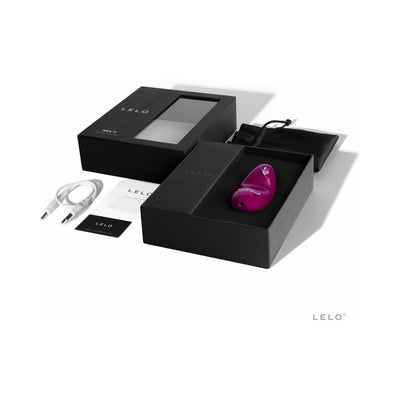 Lelo Nea 2 purple massager with floral design in black box packaging including USB charging cable, pouch, and manuals.