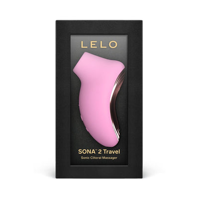 Compact pink LELO Sona 2 Travel sonic clitoral massager in sleek black packaging with gold lettering.