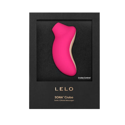 Lelo Sona Cruise rechargeable clitoral stimulator in pink with beige accents displayed in black packaging.
