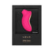 Lelo Sona Cruise rechargeable clitoral stimulator in pink with beige accents displayed in black packaging.