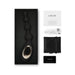 Lelo Soraya Anal Beads in black with gold accent, USB charging cable, storage pouch, user manual, and warranty card in packaging.