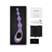 Purple Lelo Soraya Anal Beads with USB charging cable, storage pouch, warranty card, and instruction manual in black box.