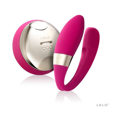 Pink silicone Lelo Tiani 2 couples massager with wireless remote control on white background.