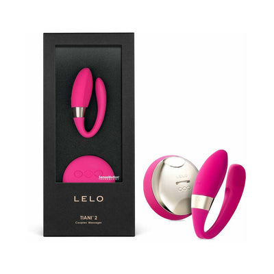 Lelo Tiani 2 pink silicone couples massager with wireless remote in black packaging box on white background