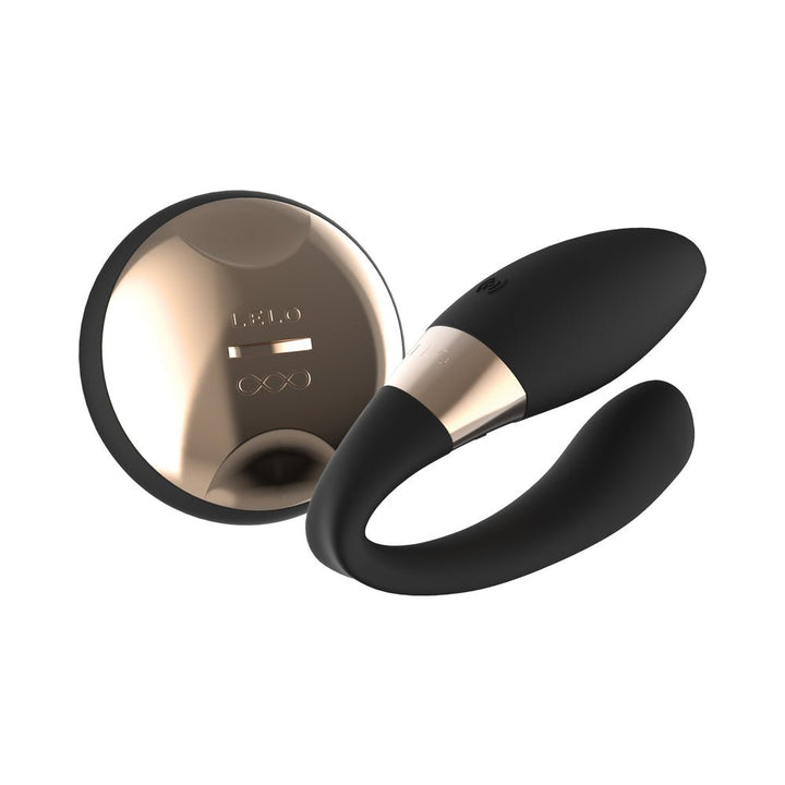 Lelo Tiani Duo couples vibrator in black silicone with gold-toned wireless remote control on white background.
