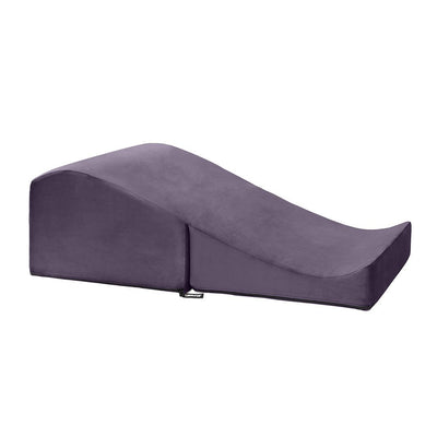 Plum-colored Liberator Flip Ramp with soft velvish cover, ergonomic curved design for versatile support and positioning.