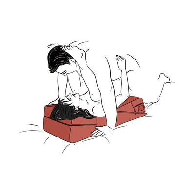 Illustration of a couple using a red Liberator Wedge/Ramp Combo cushion for comfortable and supported intimate positioning.