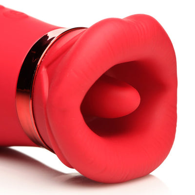 Close-up of red silicone clitoral stimulator with soft kissing lips and a textured tongue feature.