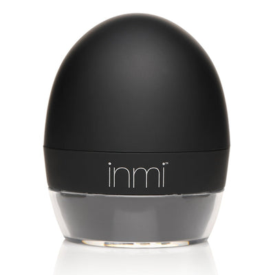 Black and clear sleek egg-shaped container with inmi logo on front, designed for personal care or cosmetic use.