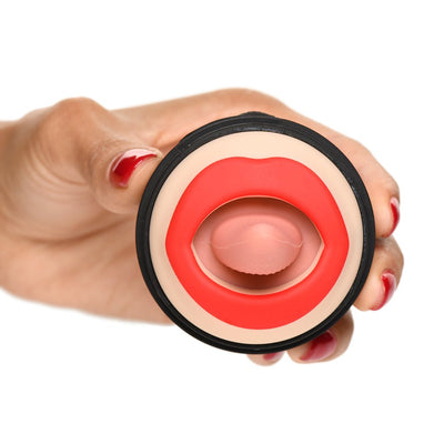 Hand holding Lickgasm Lady Licker clitoral stimulator with red lips and textured pink tongue detail.