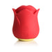 Compact red silicone clitoral stimulator shaped like a rose with control buttons and gold base.