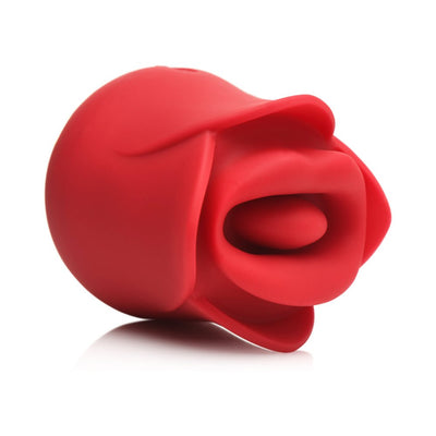 Red silicone clitoral stimulator shaped like a blooming rose with a central vibrating tongue feature.