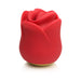Compact red silicone clitoral stimulator shaped like a rose with control buttons on the side.