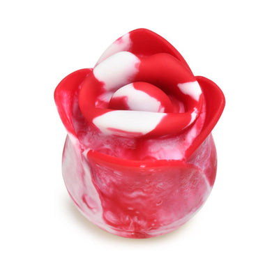 Compact red and white silicone rose-shaped clitoral stimulator with smooth, swirling petal design.