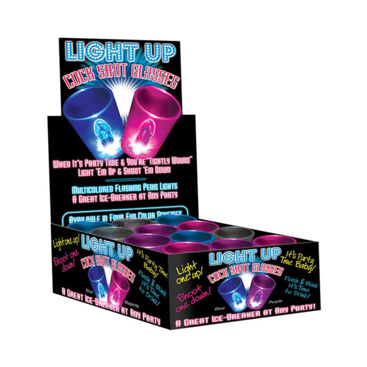 Display box of light-up novelty shot glasses in blue, magenta, and black with playful party-themed packaging.
