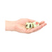 Hand holding two glow-in-the-dark dice featuring playful position and location icons for intimate games.
