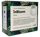 In Bloom Lilium massaging vibrator packaging with tropical leaf design and product description on box.