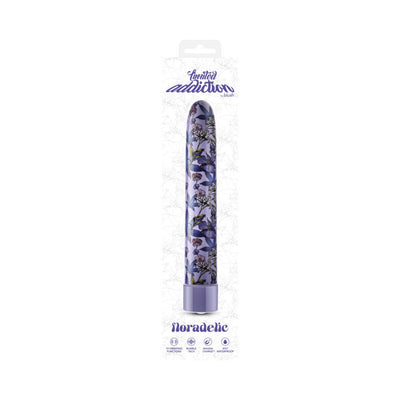 Blue floral patterned slimline vibrator in clear packaging with Limited Addiction branding and feature icons.