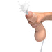 Hand holding a lifelike dual-density 10-inch dildo squirting fluid from the tip against a white background.