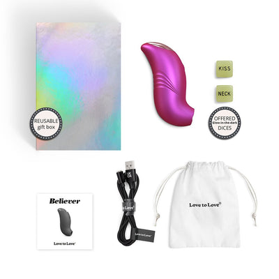 Love To Love Believer Iridescent vibrator with reusable gift box, glow-in-the-dark dice, USB charging cable, and storage pouch.