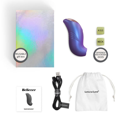 Iridescent Love To Love Believer device with reusable gift box, glow-in-the-dark dice, USB charging cable, pouch, and instruction manual.