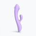 Lavender dual stimulator with curved design and separate clitoral arm, made of smooth silicone.