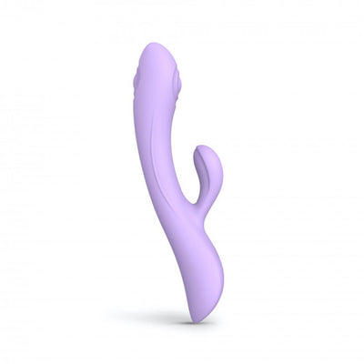 Lavender dual stimulator with ergonomic curved design and separate clitoral arm, made of smooth silicone.