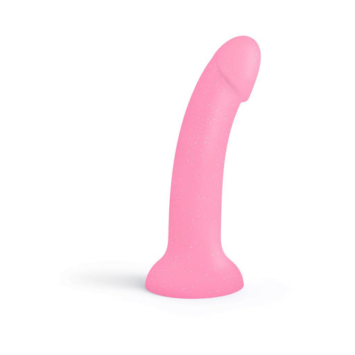Pink curved silicone dildo with glitter and suction cup base, standing upright on white background.