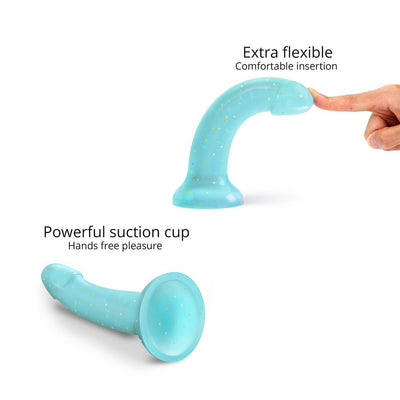Blue translucent curved silicone toy with gold star glitter, shown flexible and featuring a strong suction cup base.