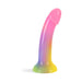 Curved rainbow-colored dildo with glitter and suction cup base made of smooth liquid silicone.