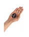Hand holding a black double silicone cockring with two openings, designed for comfort and flexibility.