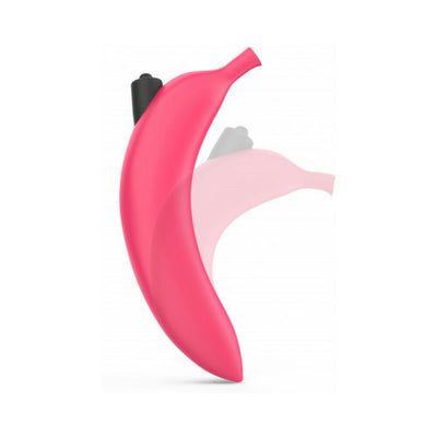 Pink silicone vibrator with curved design and black control button, shown in motion effect on white background.